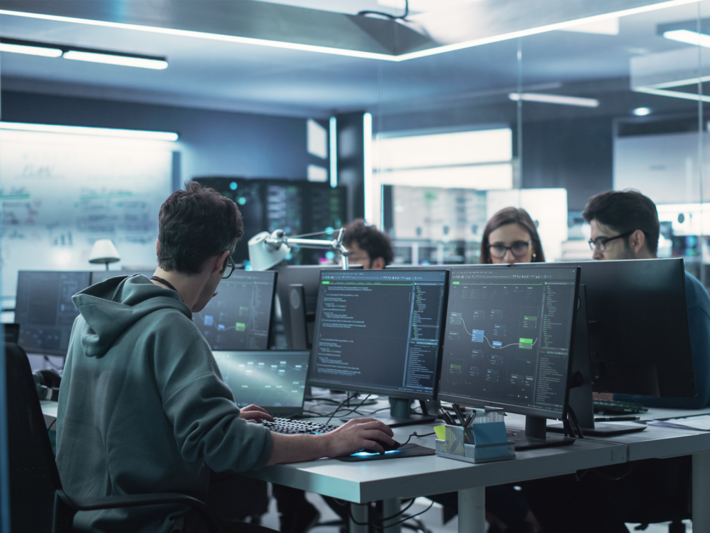 Team of people working together to solve problems and analyze data